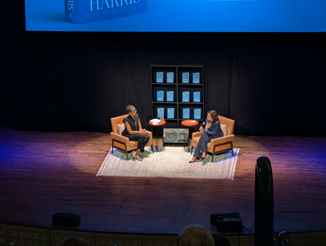 Rukaiyah Adams and Vice President Kamala Harris on stage at Arlene Schnitzer Concert Hall.